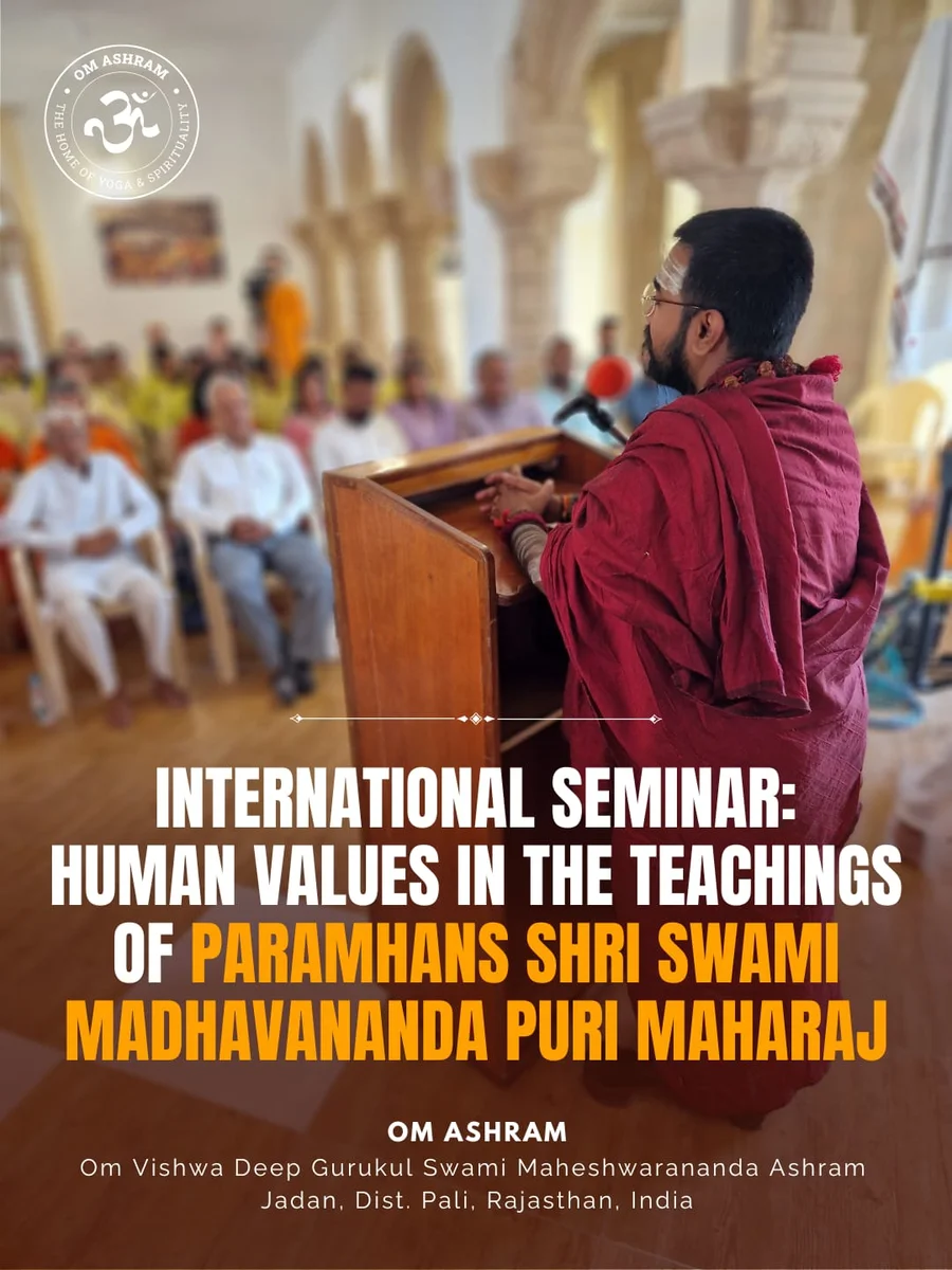 Assembly of spiritual leaders, scholars, and devotees at the Om Ashram auditorium in Jadan.
